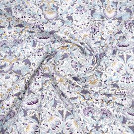 Tissu coton crème à motif fleurs entrelacées mauve, beige et bleu ciel | Pretty Mercerie | mercerie en ligne