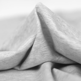 Tissu jersey de coton gris clair chiné 130gr