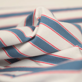 Tissu jersey de coton écru à motif rayure tissées bleu clair et rouge