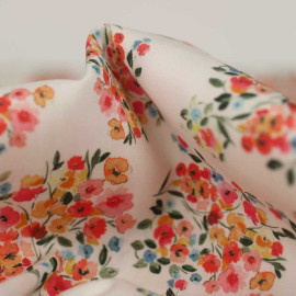 Tissu viscose Aurore blanc cassé à motif bouquets de fleurs vert et orange