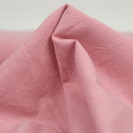 Tissu coton brut lavé effet vintage uni - rose pastel